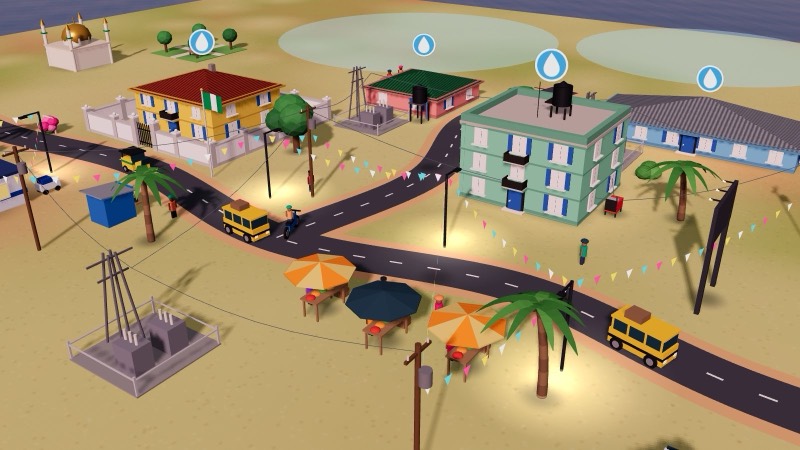 The street at night with glowing lamps and bunting.